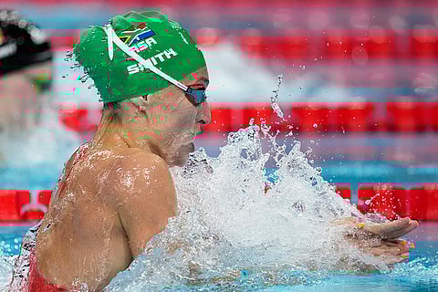Tatjana Smith competes in the women's 100-meter breaststroke final